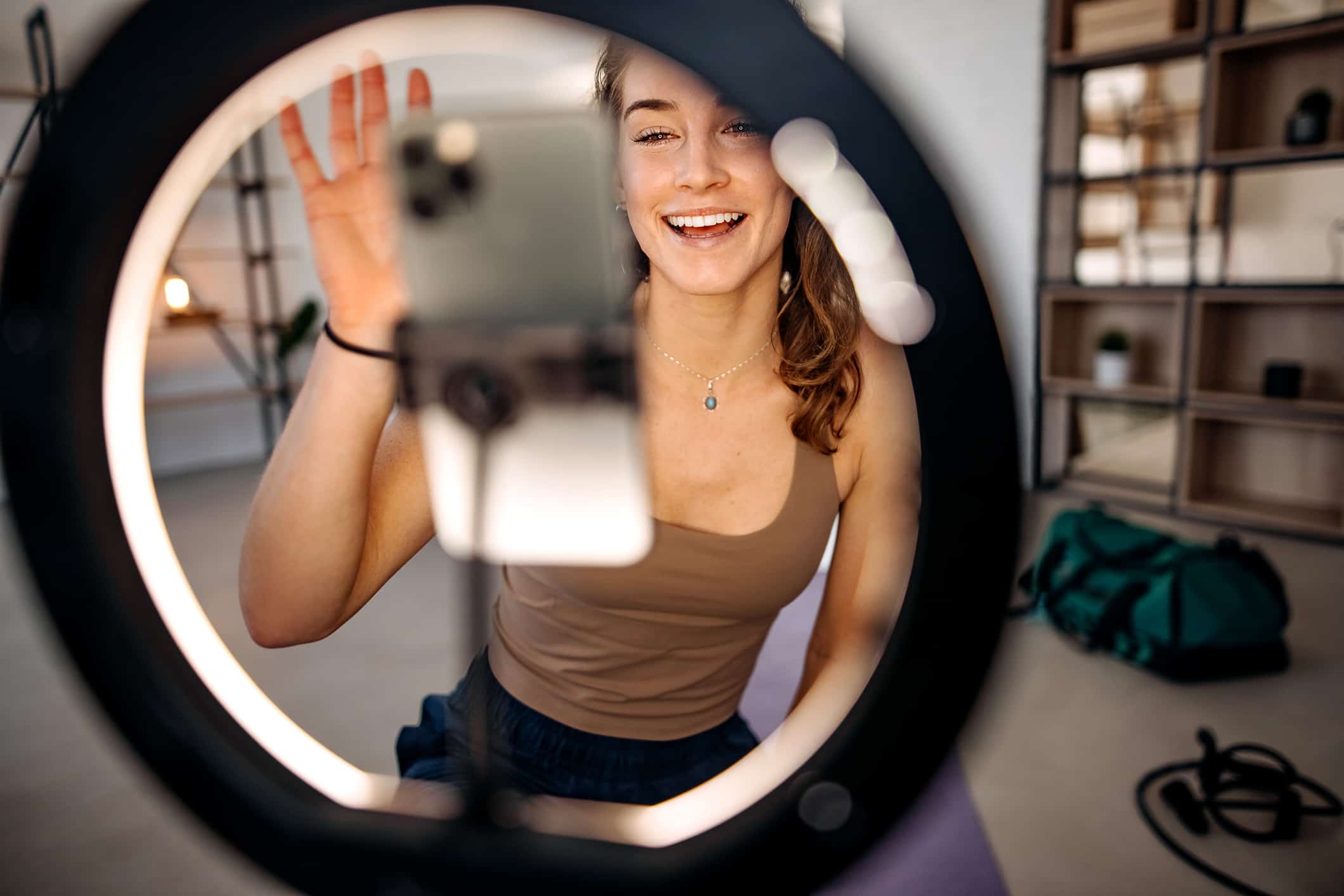 Woman vlogger exercising at home